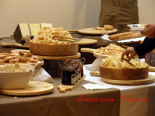 The buffet with a rich selection of cheese.