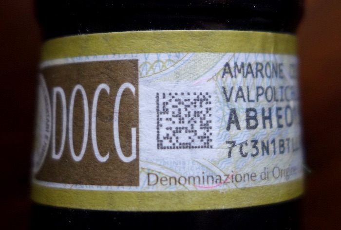 DOCG tag on the neck on an Amarone bottle.