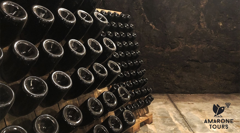 durello wine bottles inside a cellar dug in basalt